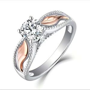 Silver Plated Diamond Solitaire with Rose Gold Wing Accents
